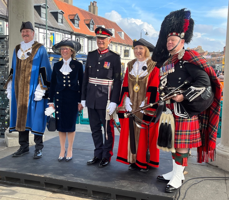 From left to right the leader of East Riding Council, The High Sheriff, Lord Lieutenant, Mayor of Beverley and bagpipe player. Beverley Saturday Market 11th September 2022.